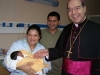 Nuncio with Qala couple and newborn baby at Gozo General Hospital
